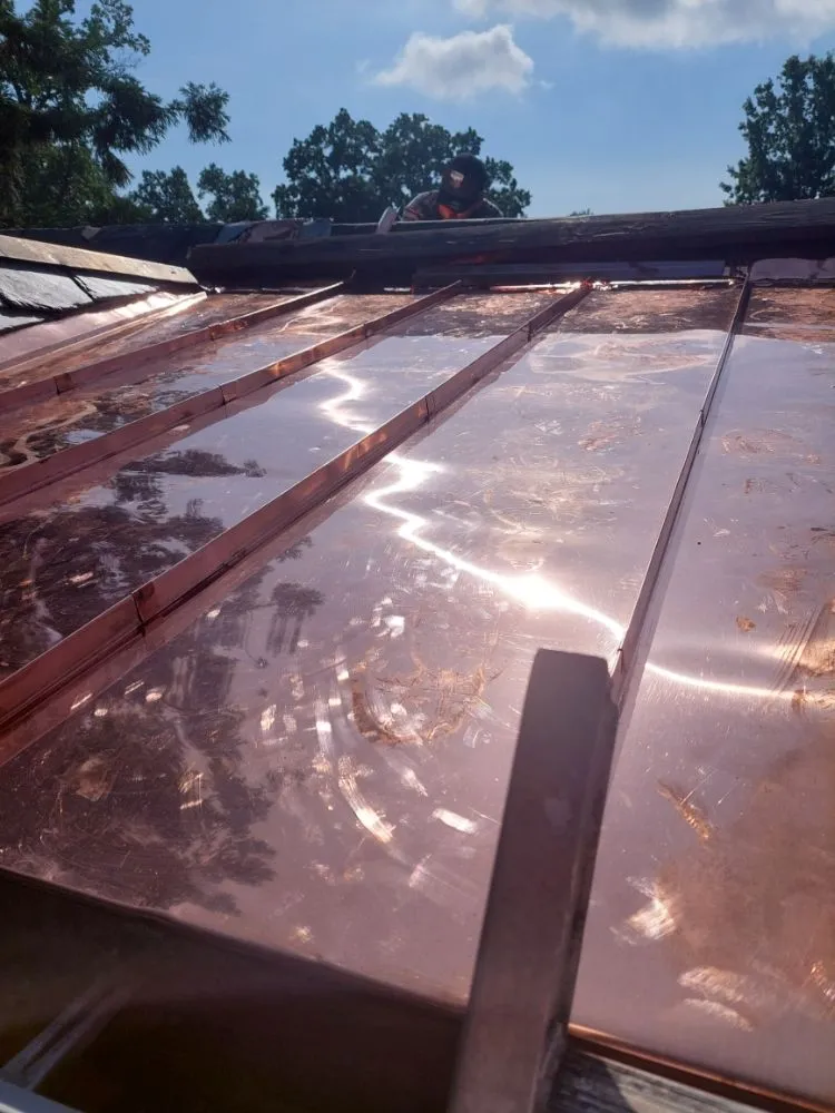 Slide of A Marten Roofing