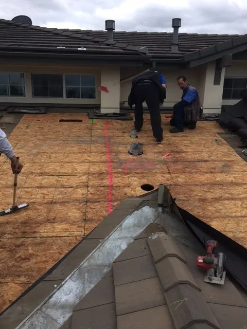 Slide of A-One Roof Management