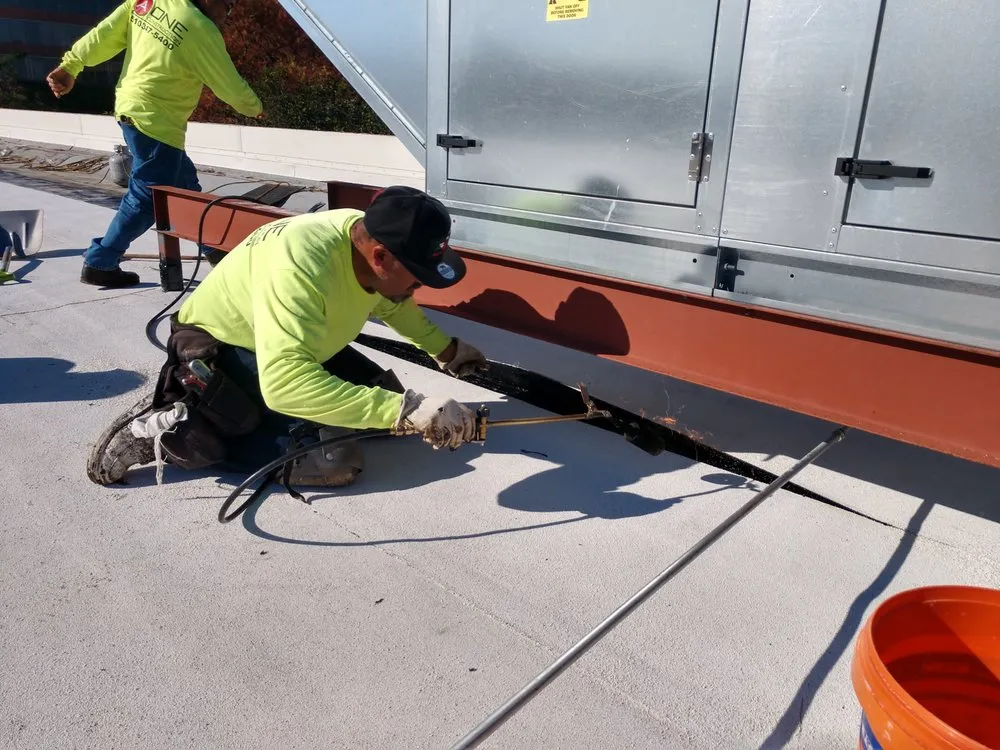 Slide of A-One Roof Management