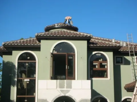 Emergency storm damage roof repair in Opaloka, FL by A Plus Roofing Corp