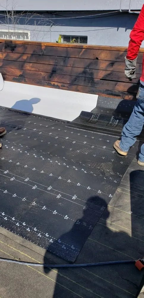 Slide of A Precision Roofing