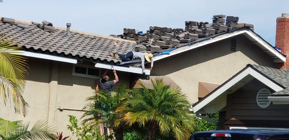 Slide of A Precision Roofing