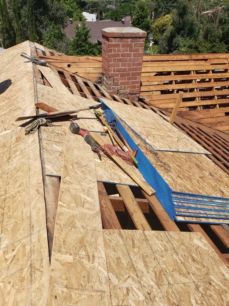 Slide of A Precision Roofing