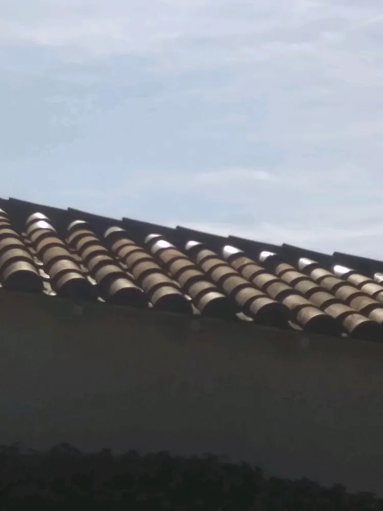 Slide of A Precision Roofing