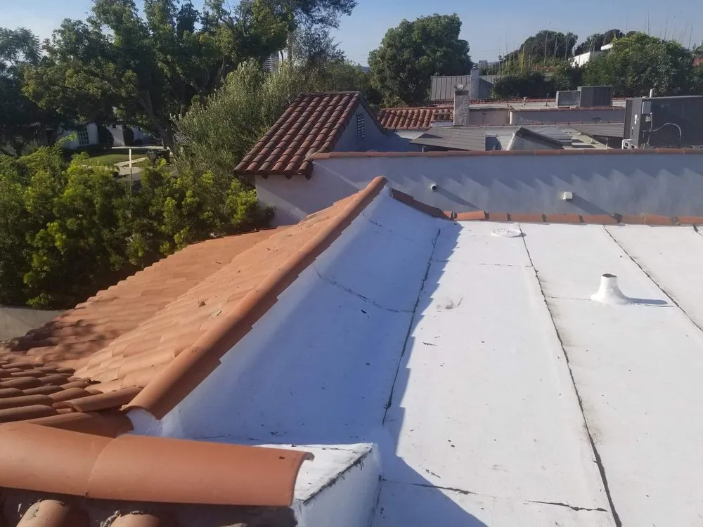 Slide of A Precision Roofing