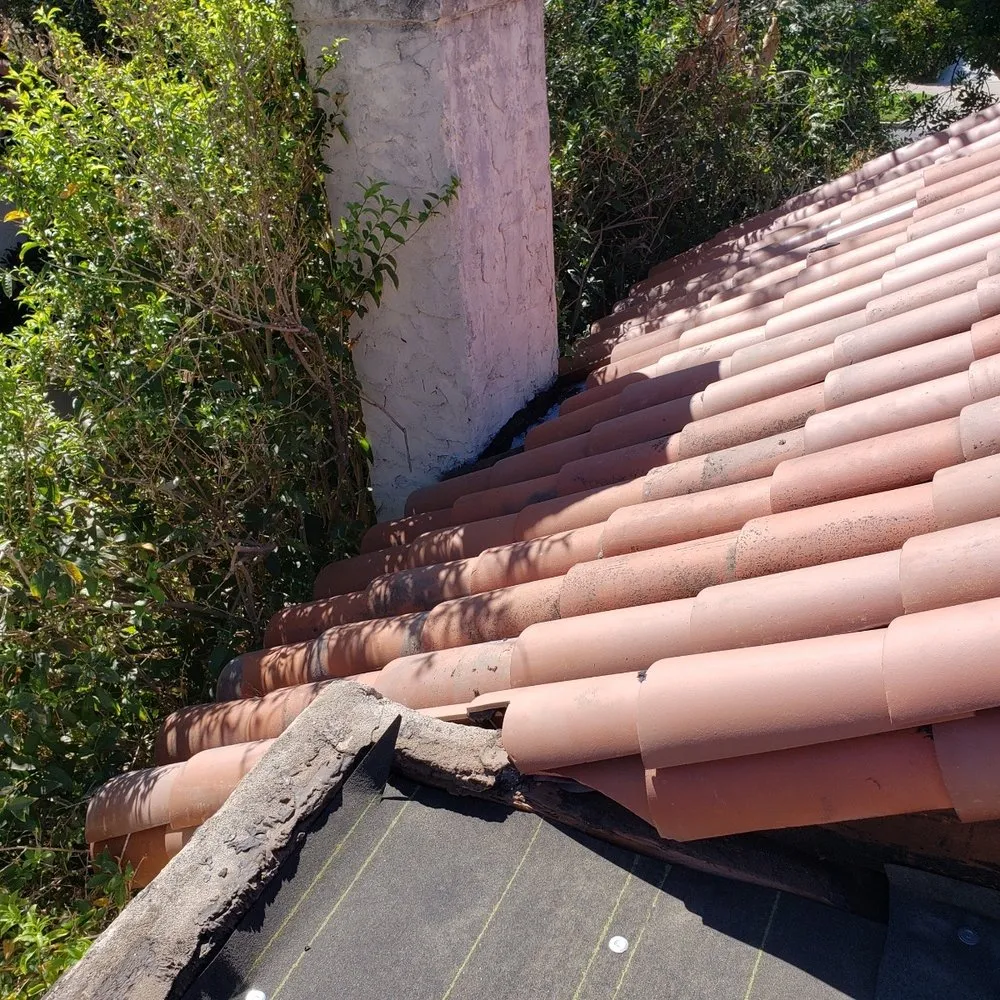 Slide of A Precision Roofing