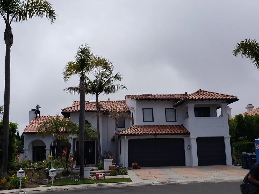 Slide of A Precision Roofing