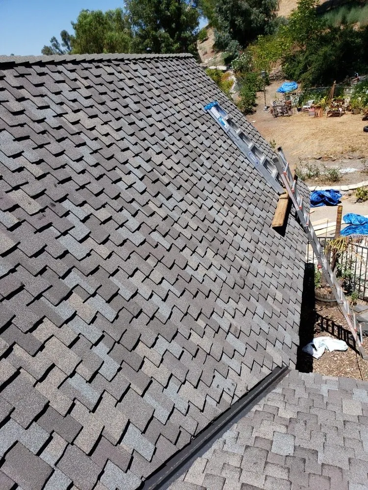 Slide of A Precision Roofing