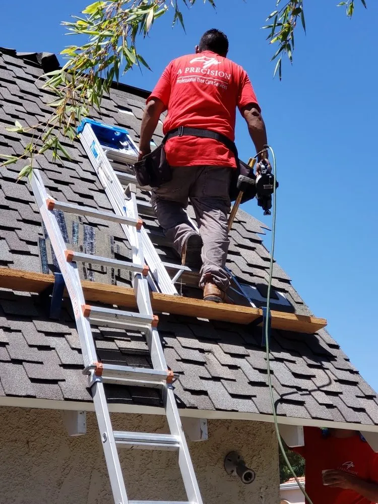Slide of A Precision Roofing