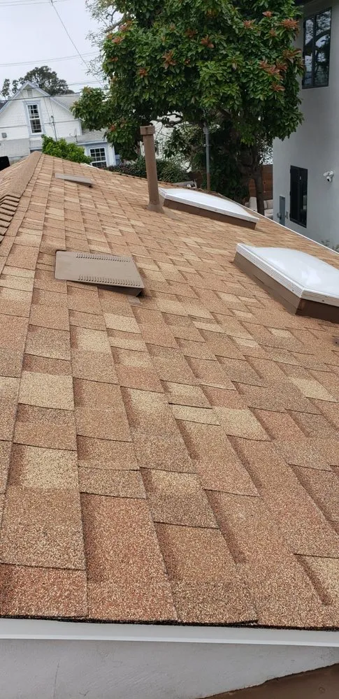 Slide of A Precision Roofing