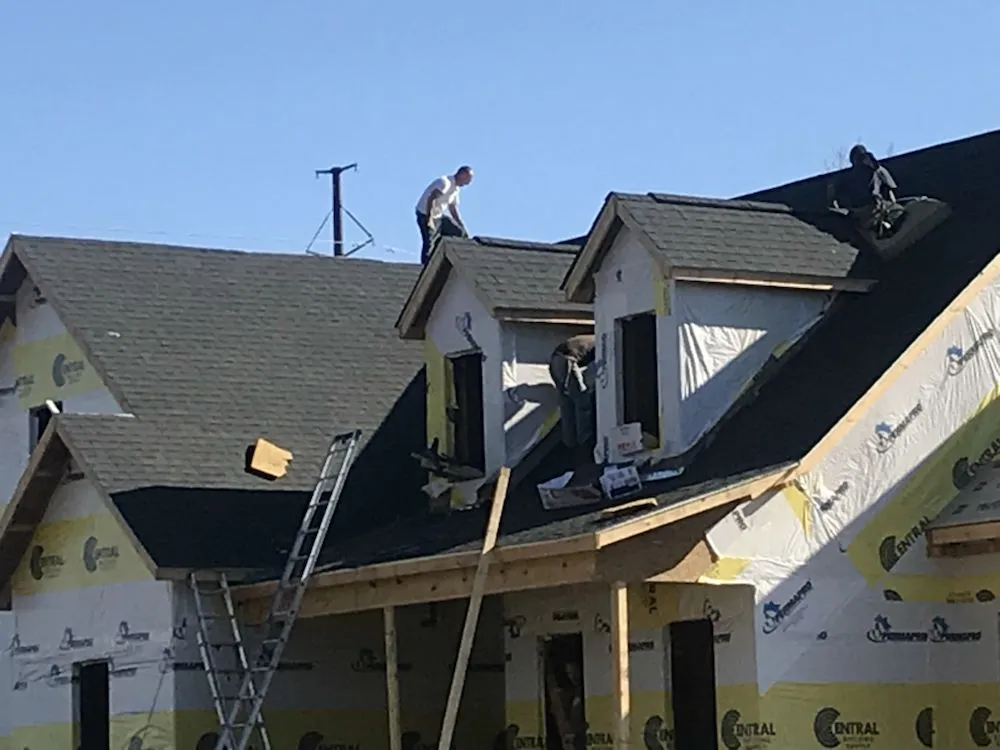 Slide of A+ Roofing and Construction