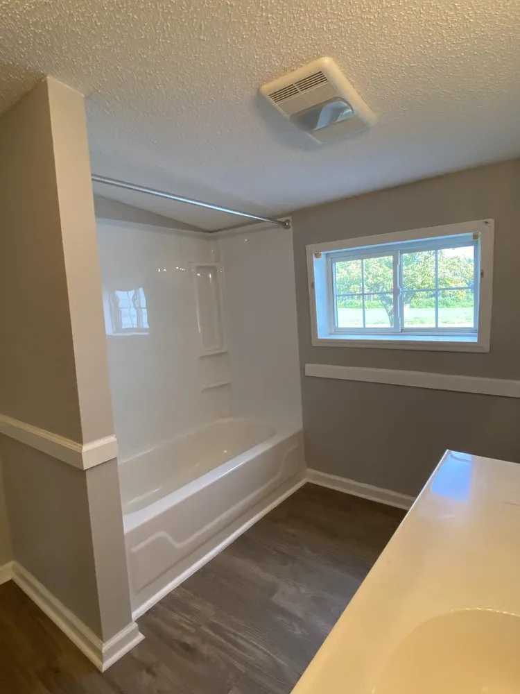 Licensed flat roof repair experts serving Pikeville, NC - A Smooth Home Improvement