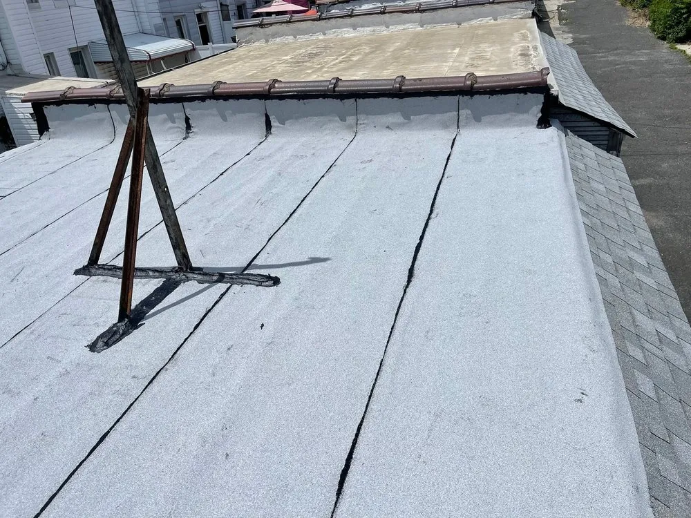 Slide of A Stewart Roofing and Waterproofing