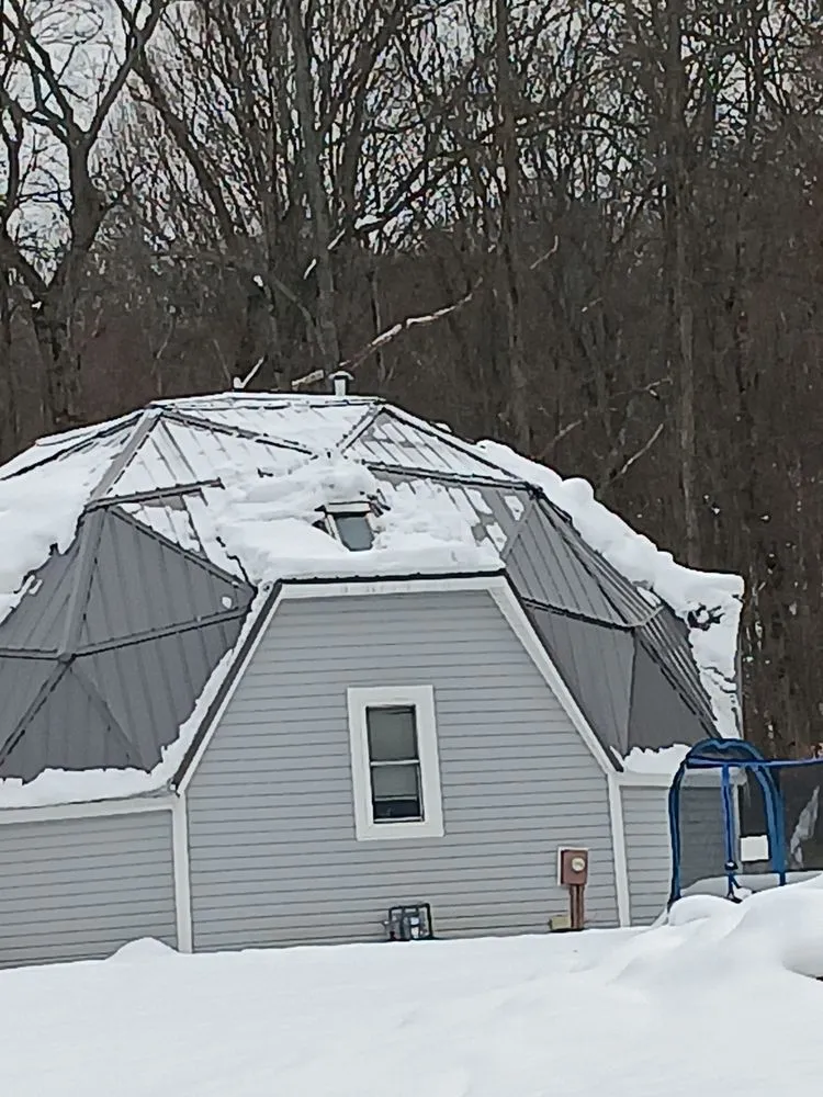 Slide of A Team Metal Roofing