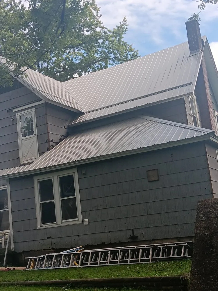 Slide of A Team Metal Roofing