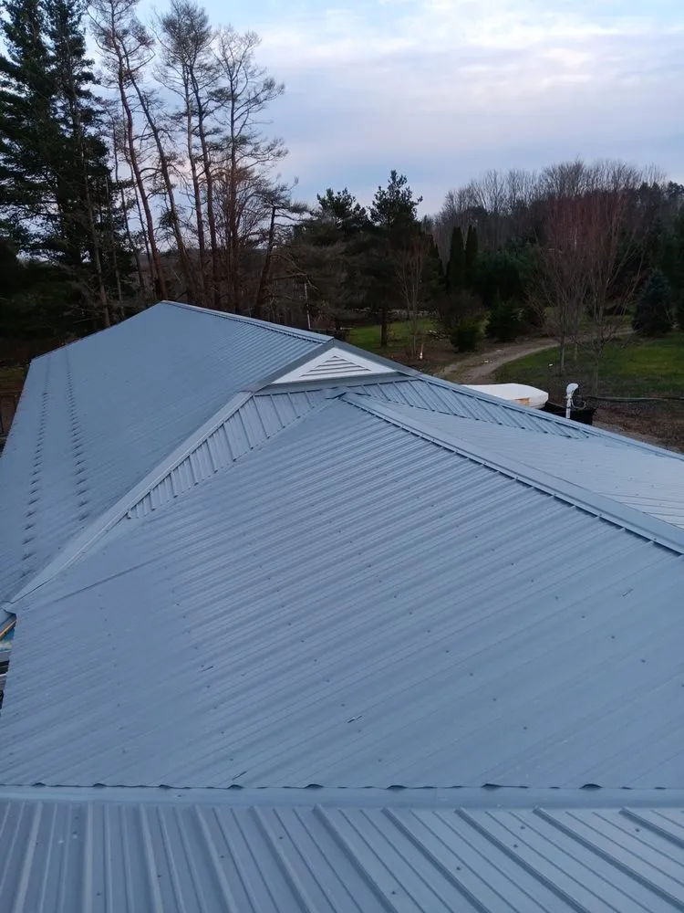 Slide of A Team Metal Roofing