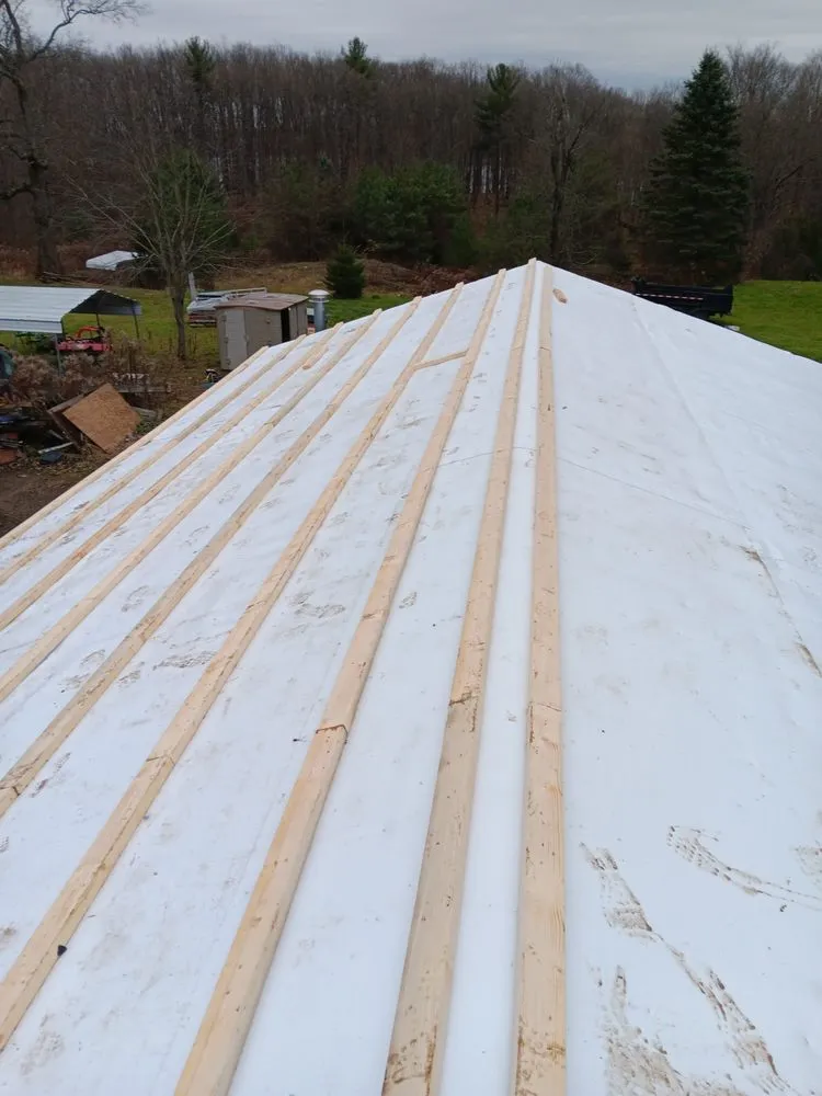 Slide of A Team Metal Roofing