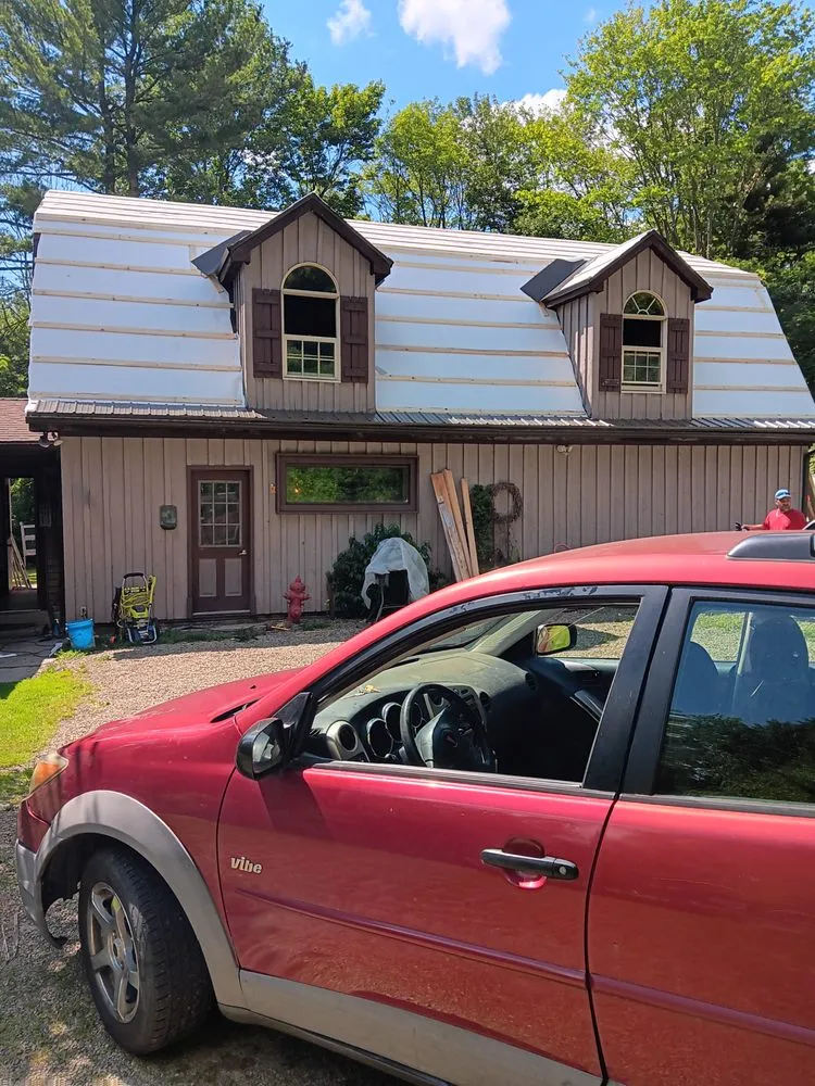 Slide of A Team Metal Roofing