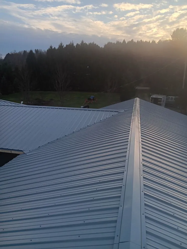 Slide of A Team Metal Roofing