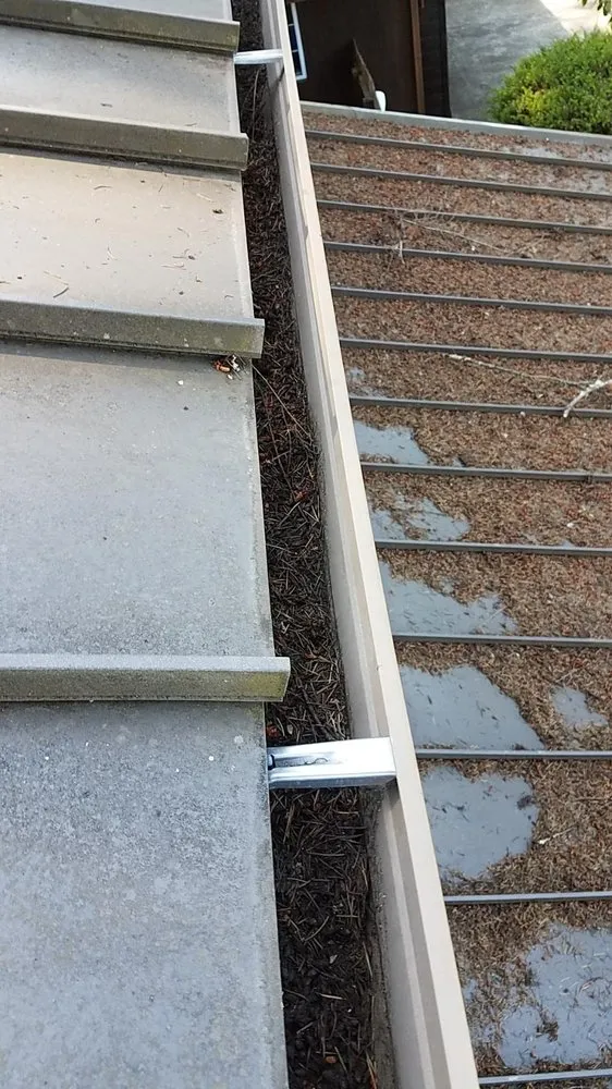 Slide of A TH Professional Roofing