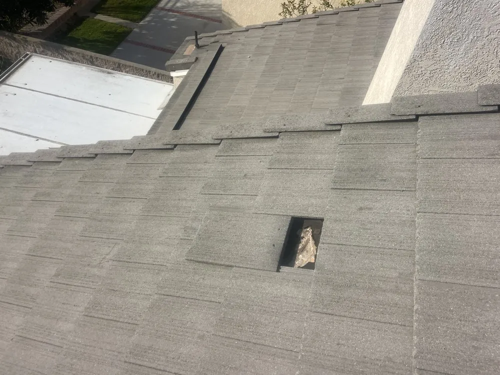 Slide of A Town Roofing