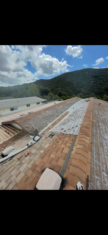 Slide of A Town Roofing