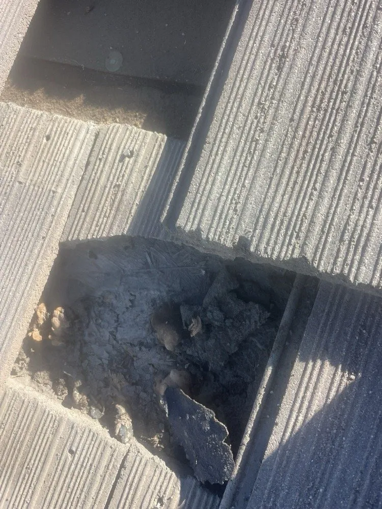 Slide of A Town Roofing