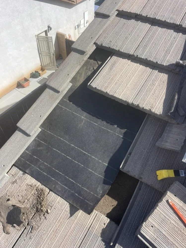 Slide of A Town Roofing