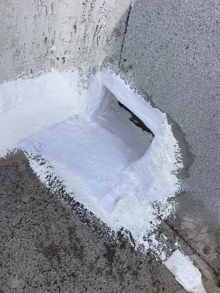 Slide of A Town Roofing