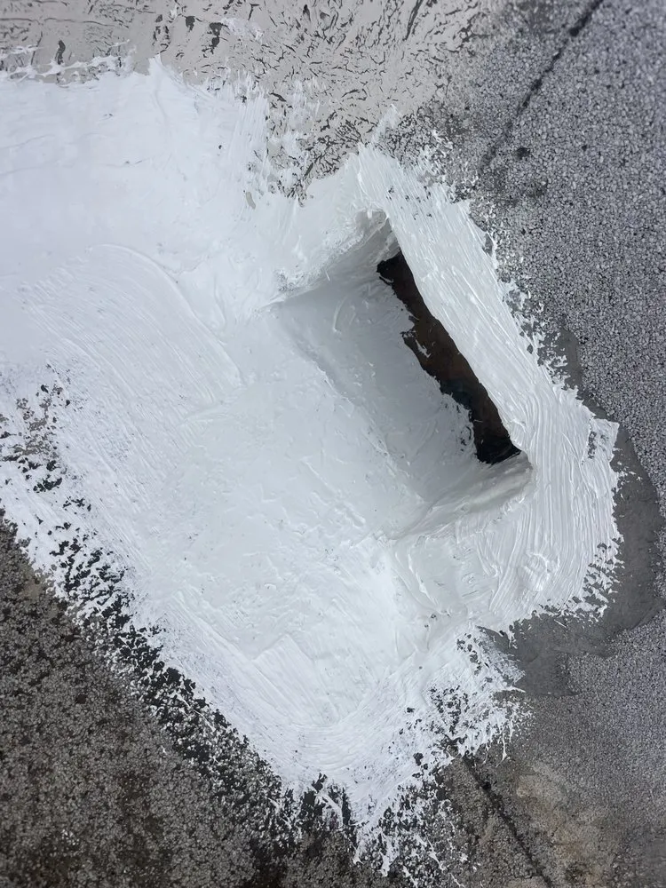 Slide of A Town Roofing