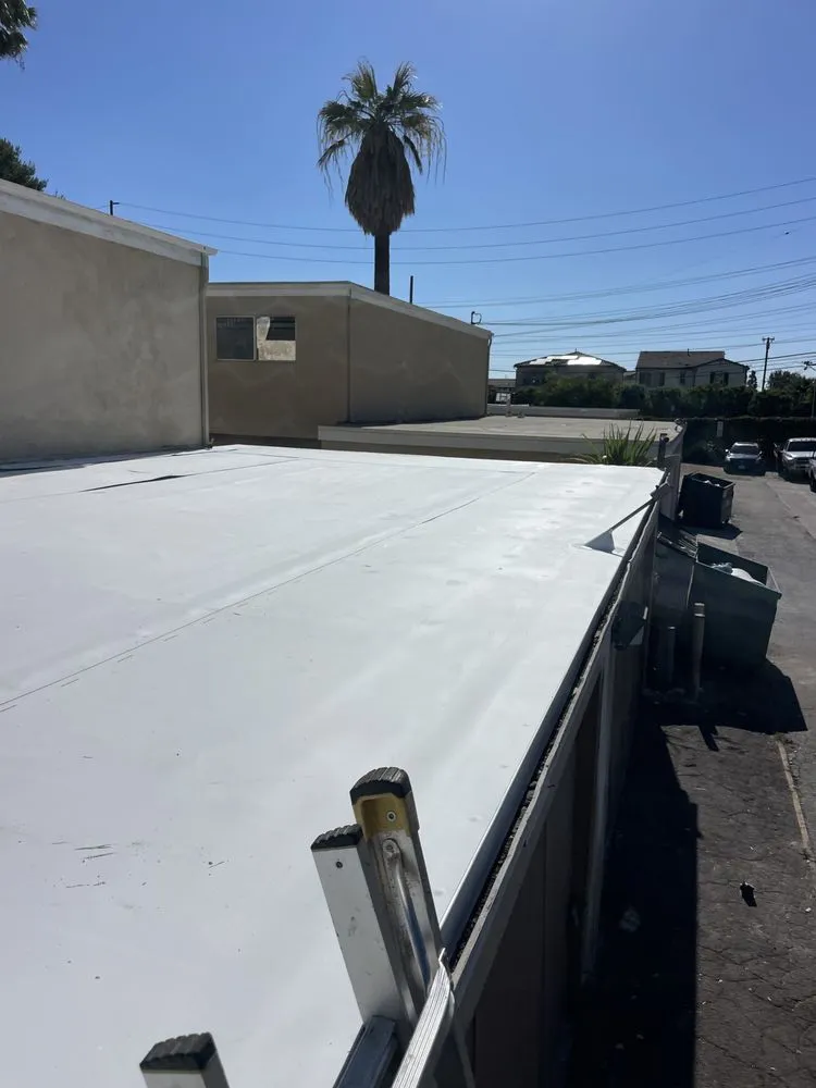 Slide of A Town Roofing