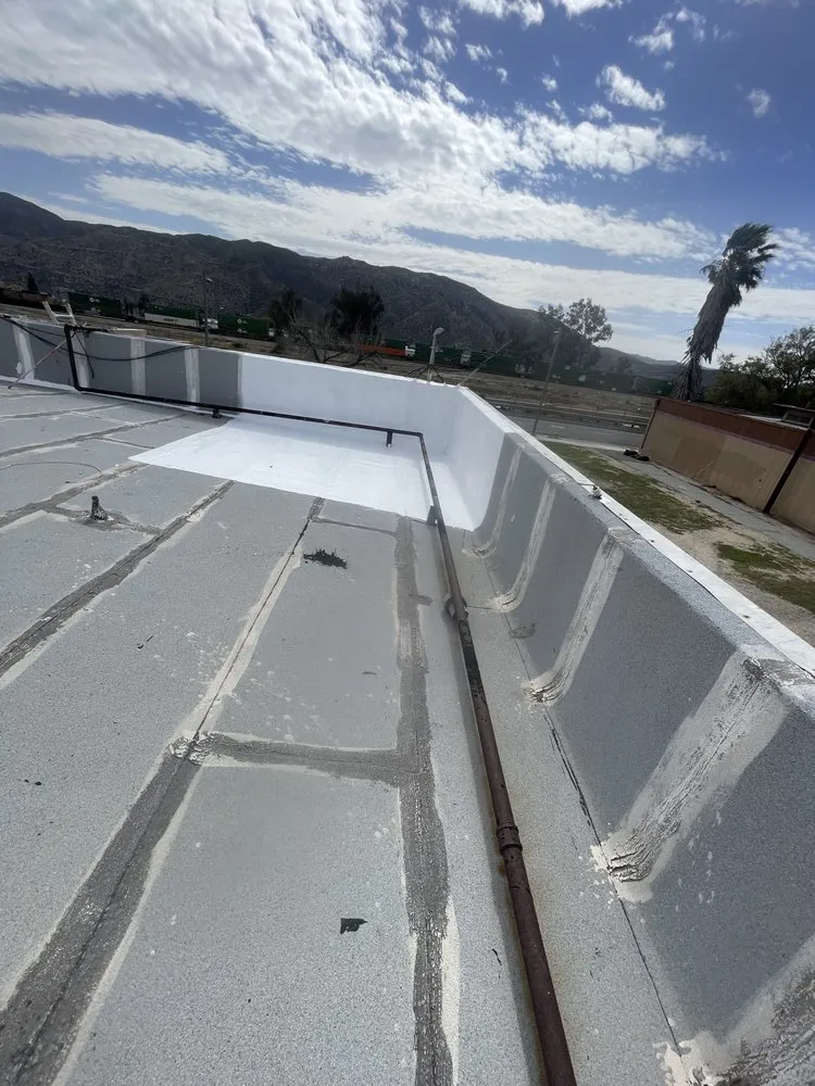 Slide of A Town Roofing