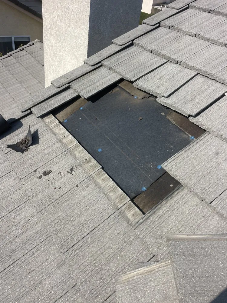 Slide of A Town Roofing