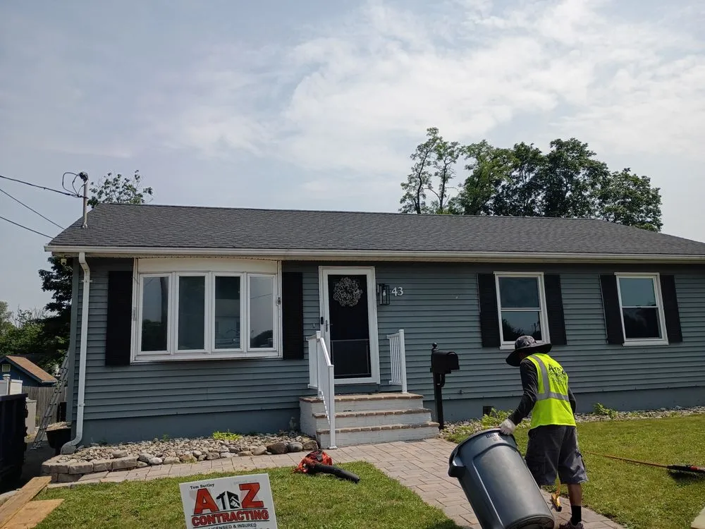 Licensed storm damage roof repair with free inspection across Monroe Township, NJ - A-Z Contracting