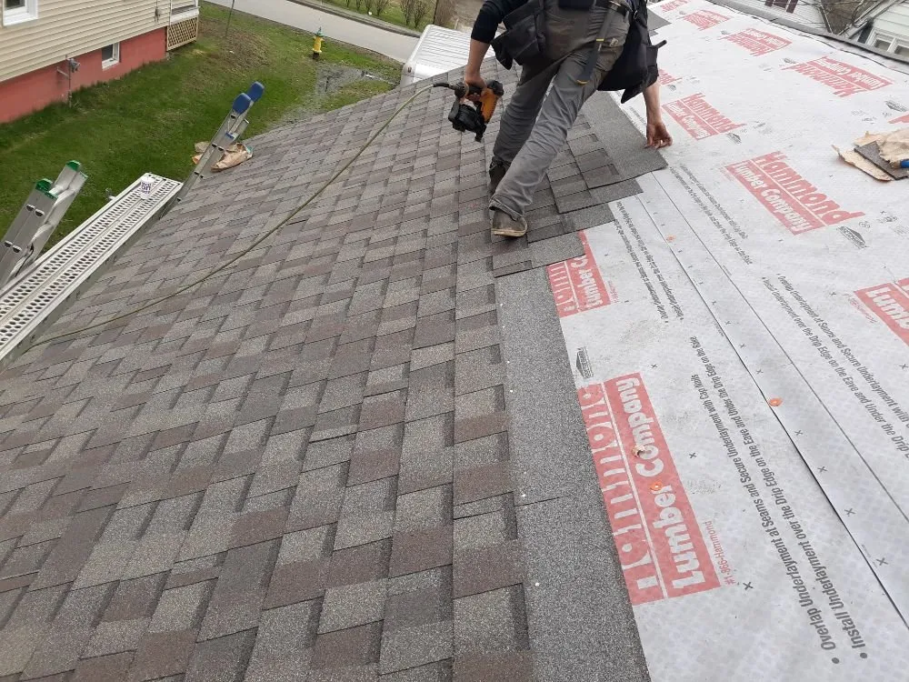 Slide of A1 Maine - Ly Roofing