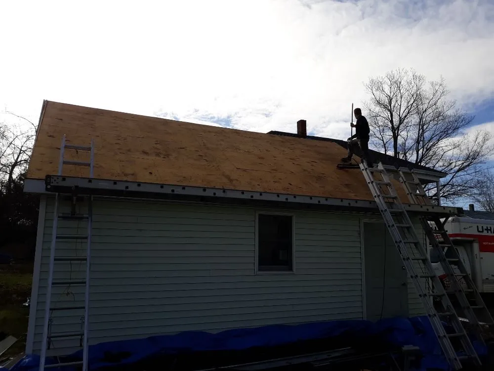 Slide of A1 Maine - Ly Roofing