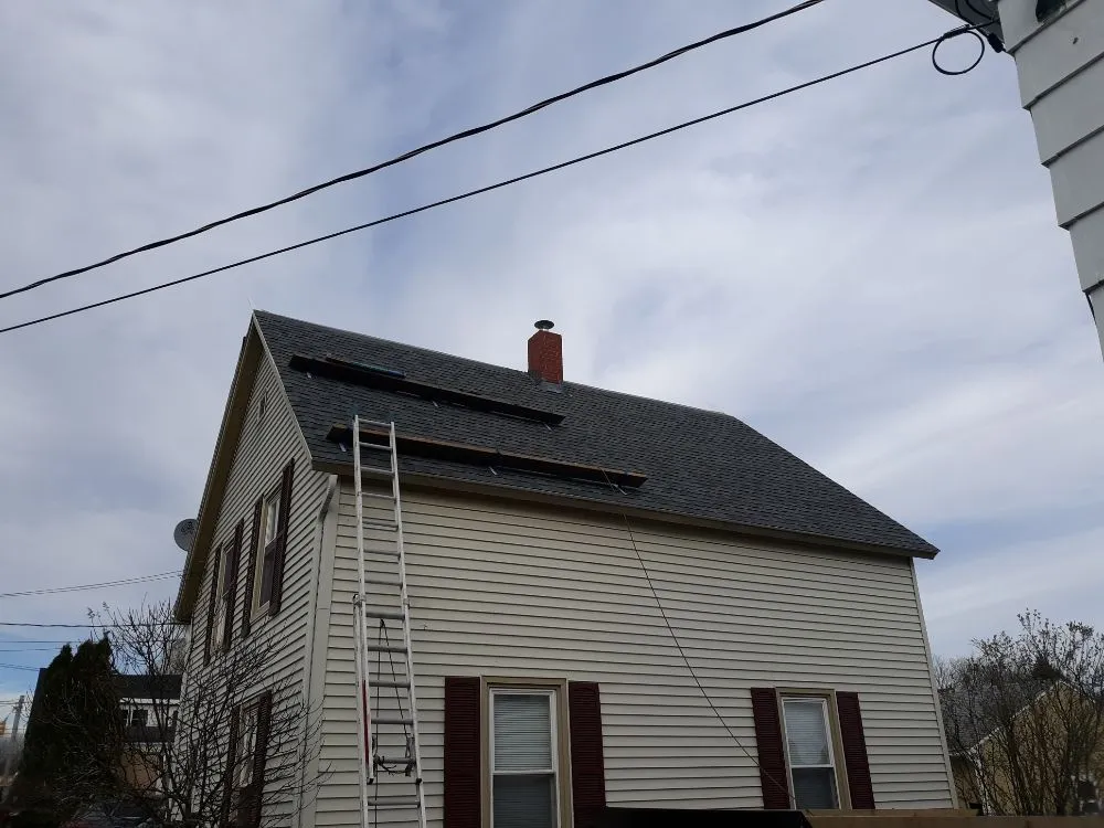 Slide of A1 Maine - Ly Roofing