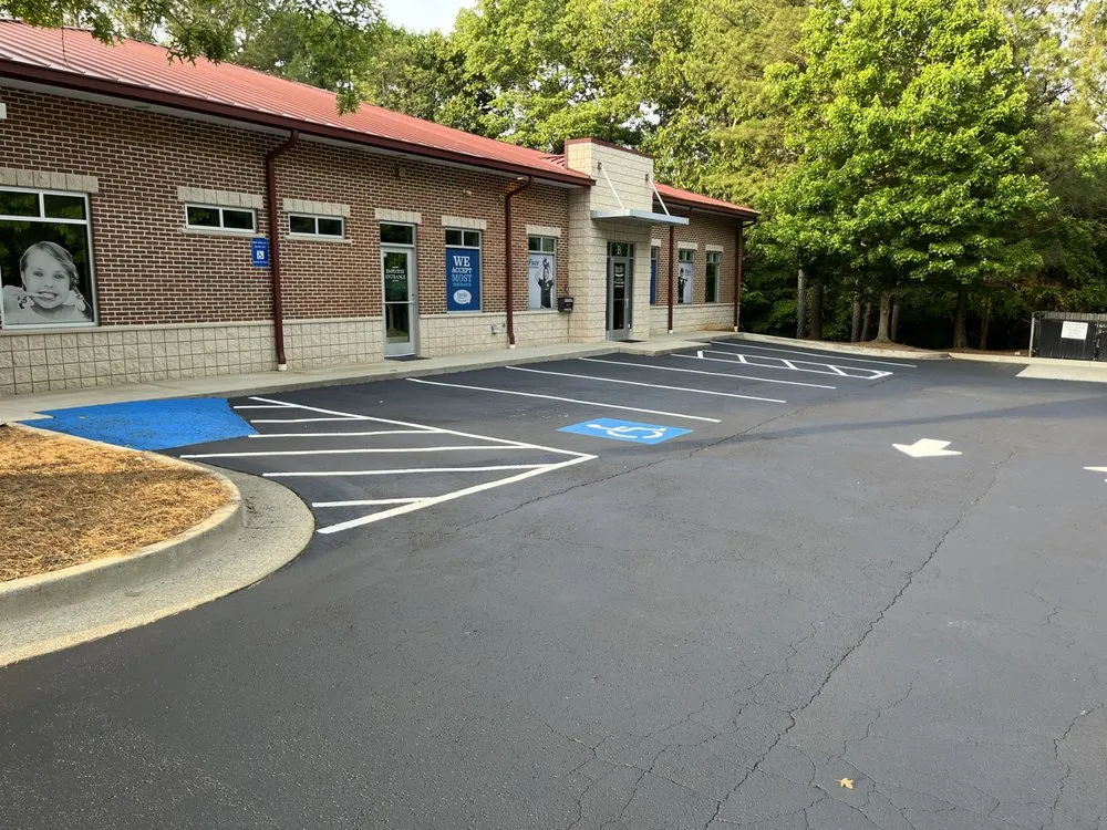 Slide of A1 Seal Coating and Roofing