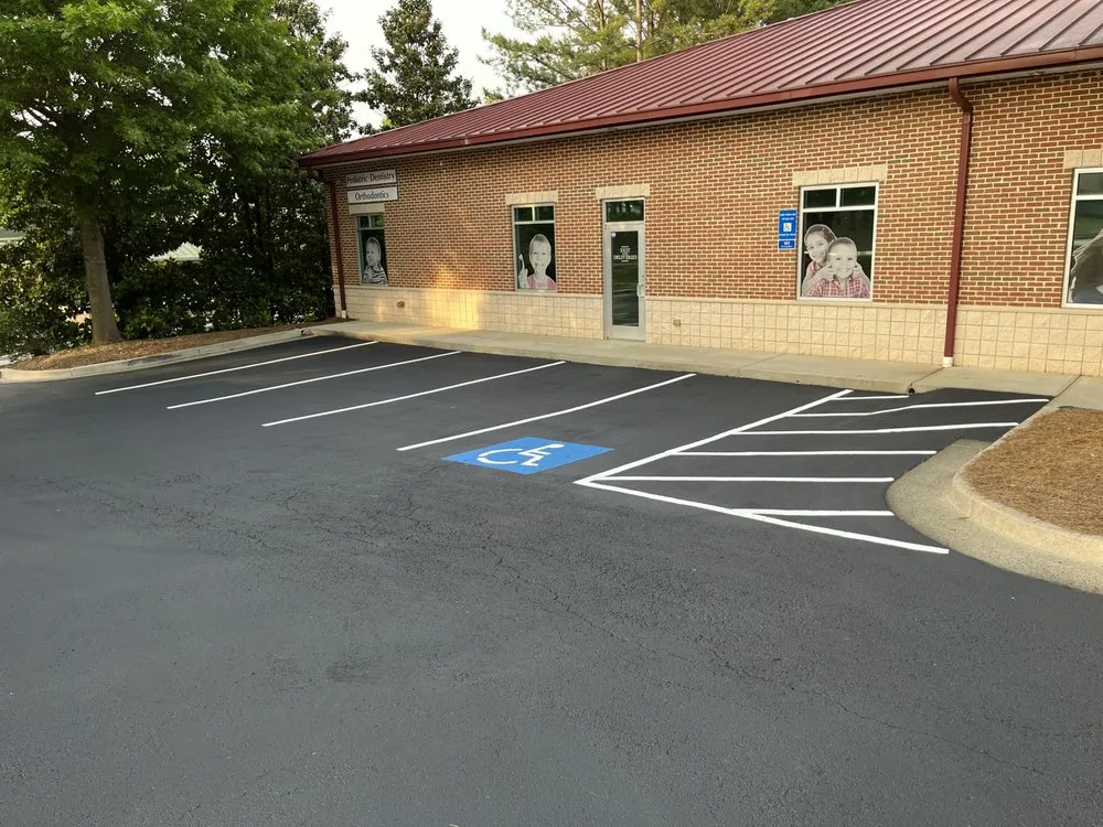 Slide of A1 Seal Coating and Roofing