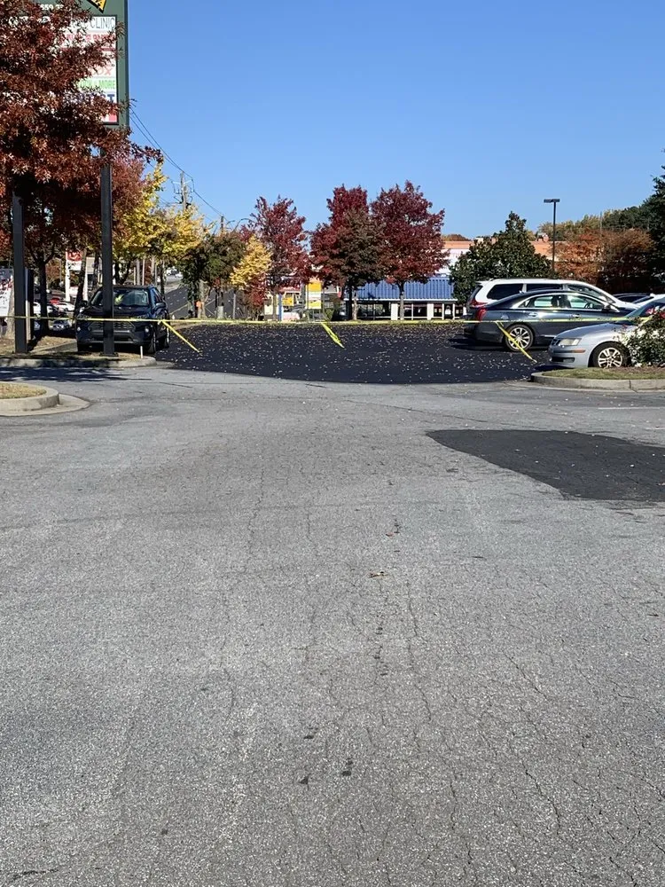 Slide of A1 Seal Coating and Roofing