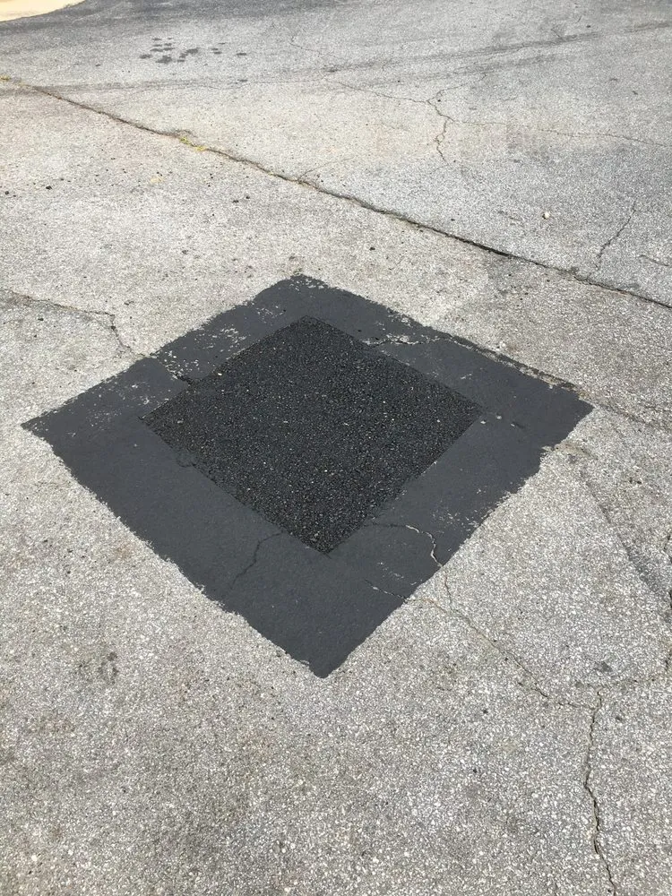 Slide of A1 Seal Coating and Roofing