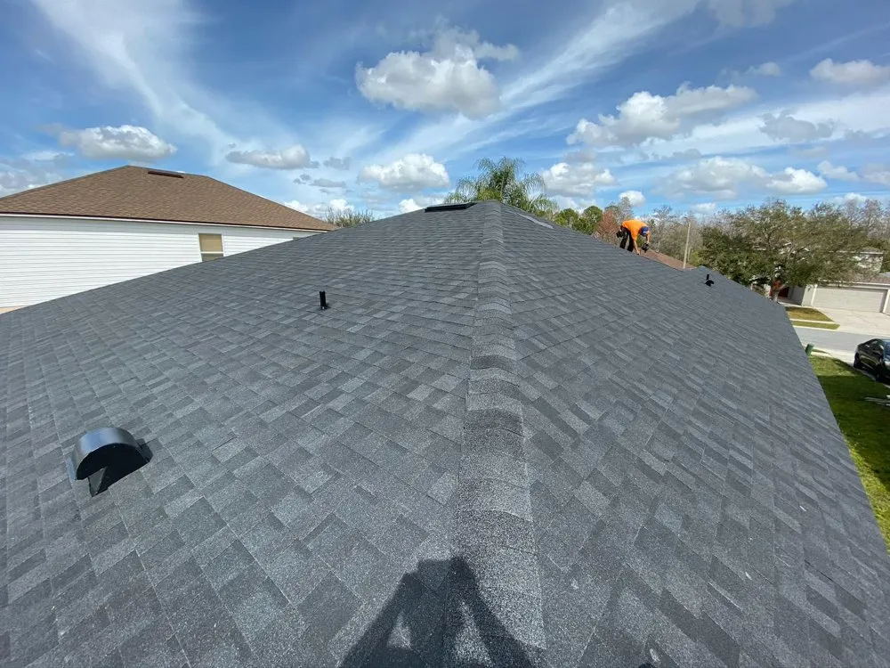 Slide of A2M Roofing