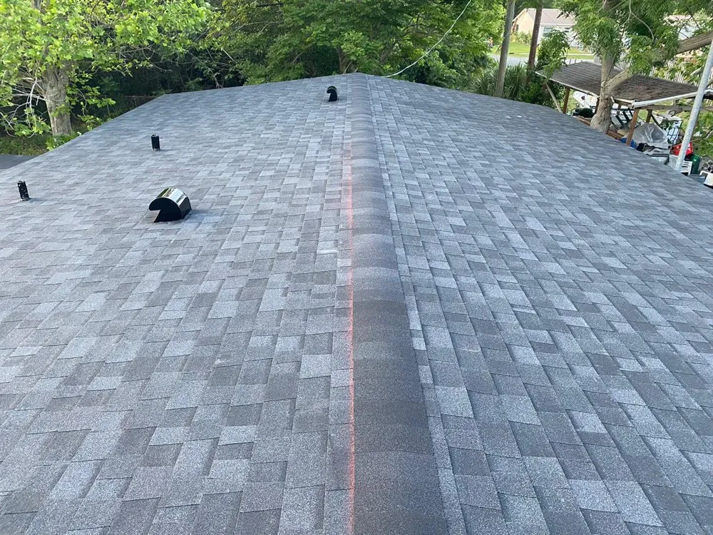 Slide of A2M Roofing