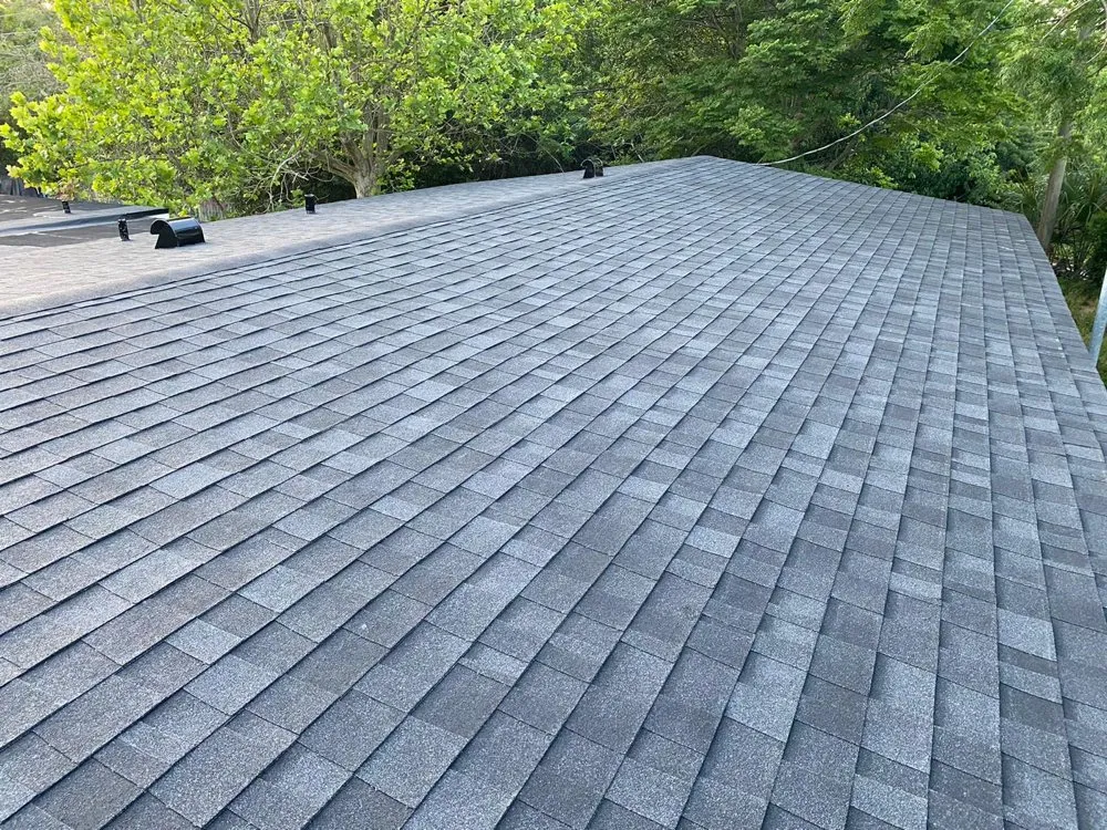 Slide of A2M Roofing