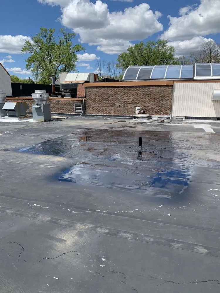 Slide of A&A Roofing