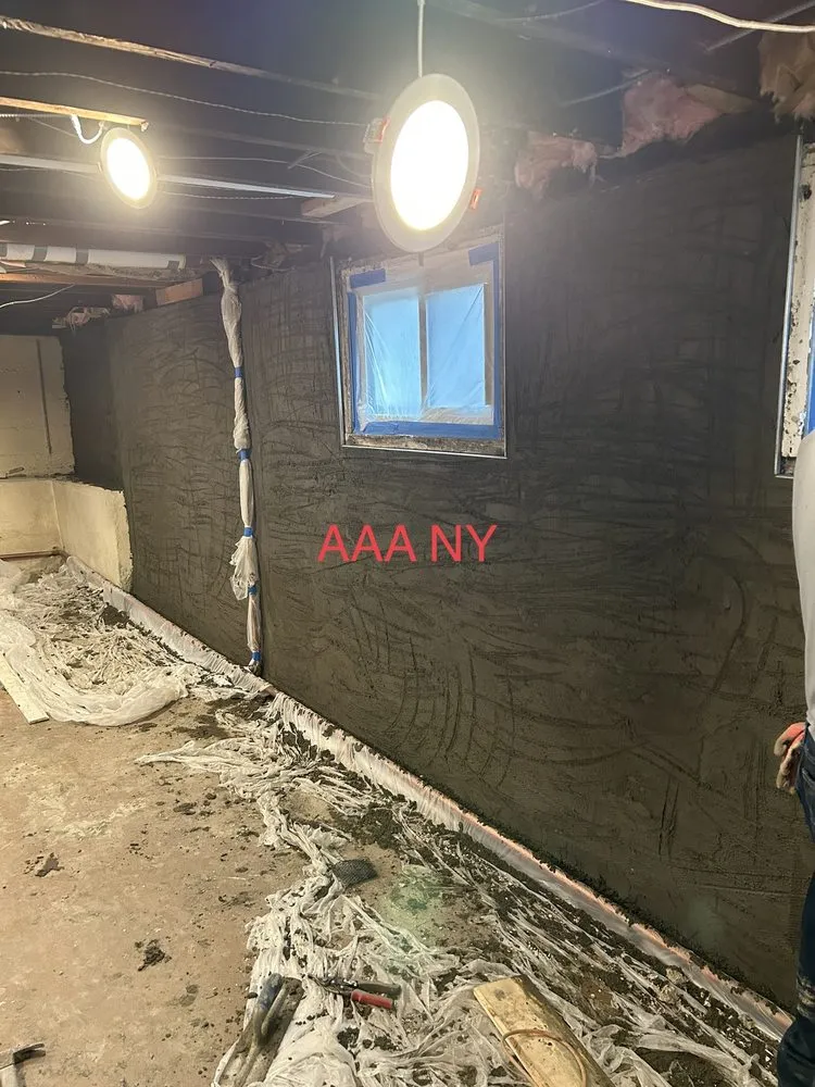 Slide of AAA Ny contracting Corp