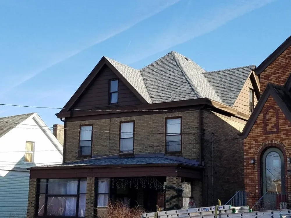 Slide of AAA Roofing