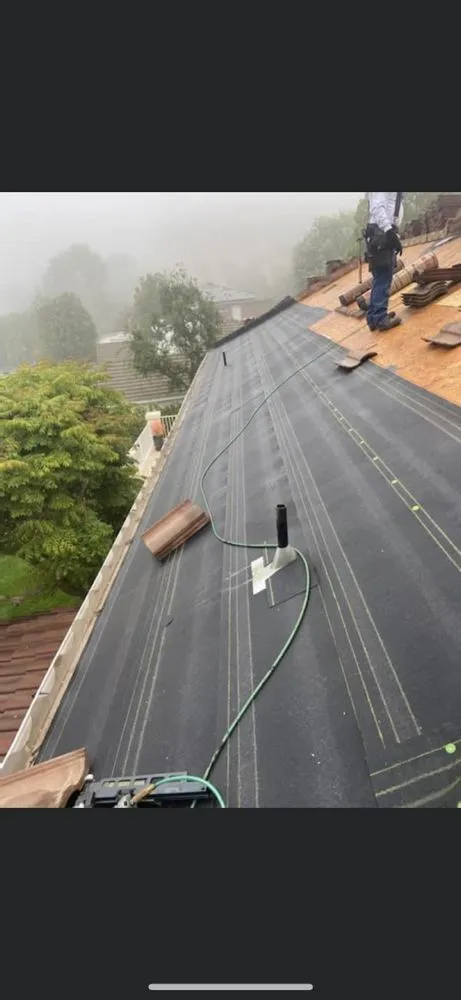 Slide of AAA Roofing Services