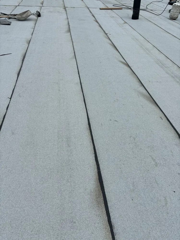 Slide of AAA Standard Roofing