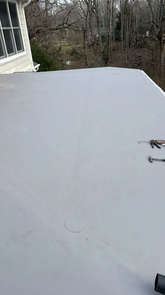 Slide of AAAS Roofing